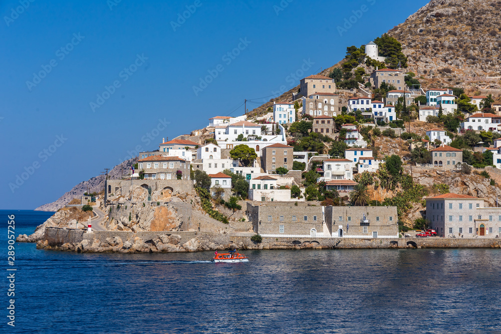 Beautiful Greek landscape of Harbour Hydra Town. Hydra is one of the Saronic Islands of Greece, located in the Aegean Sea between the Saronic Gulf and the Argolic Gulf