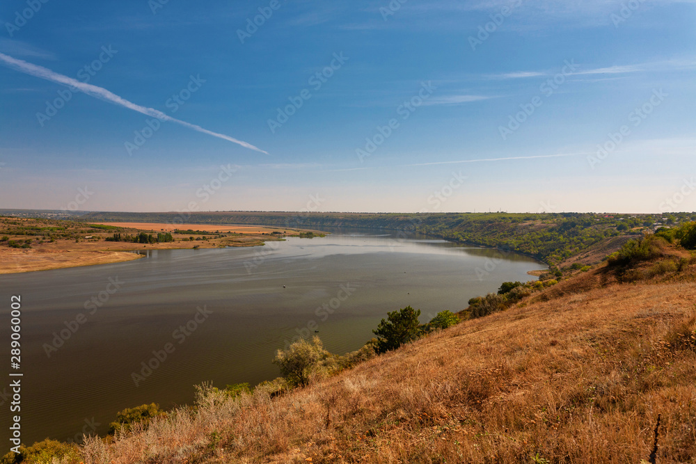 Beautiful autumn landscape with a river in the early morning, The Dniester river in Moldova near the village of Molovata