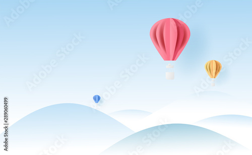 3D landscape balloons fly air on holidays blue sky background with winter snowflakes season forest.Creative minimal paper cut and craft style.Christmas and happy new year.vector illustration EPS10