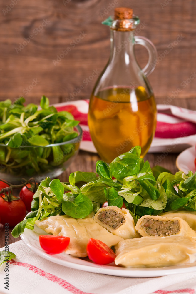 Maultaschen - swabian filled pasta ( ravioli ). Maultaschen - swabian filled pasta ( ravioli ).