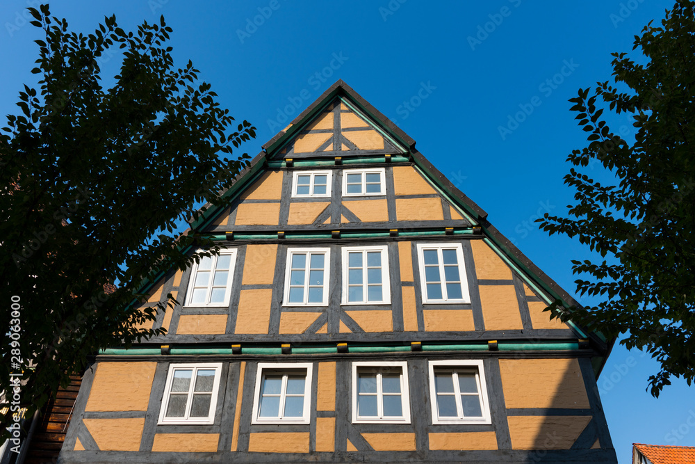 Orange half timbered house in Hameln, Germany Orange half timbered house in Hameln, Germany