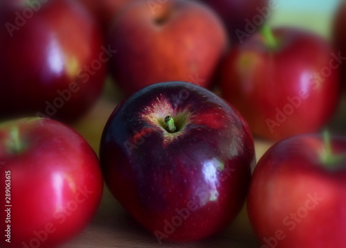 red apples on black background