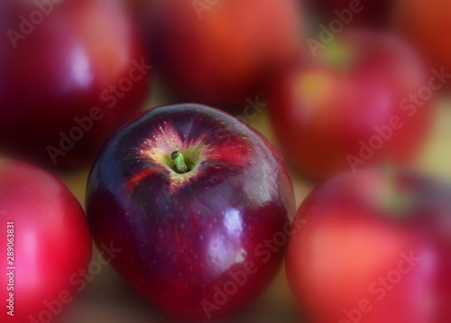 red apples on black background