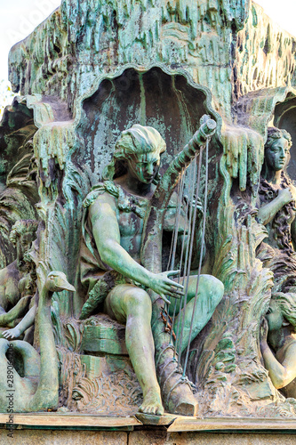 Stockholm, Sweden. Fountain by J. P. Molin, opened in 1866 at Kungstradgarden Park photo