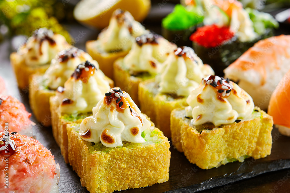 Delicious asian food, roll, sushi and gunkan set Delicious asian food, roll, sushi and gunkan set
