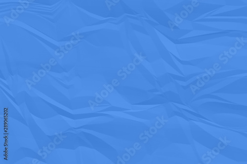 crumpled blue paper background close up