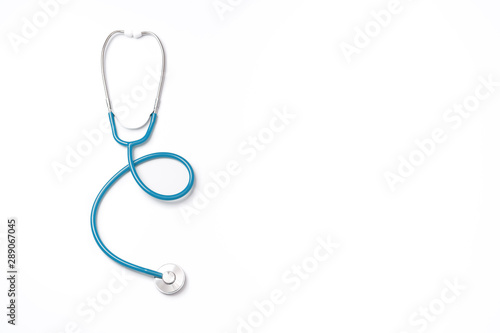 Green stethoscope, object of doctor equipment, isolated on white background. Medical design concept, cut out, clipping path, top view, studio shot.