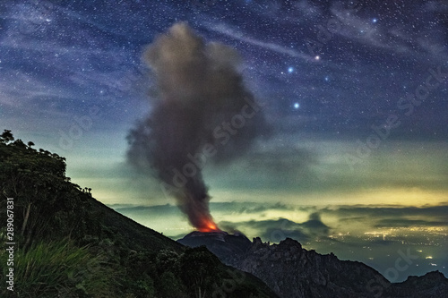 Volcano Santiaguito at night, view from Santa María, Guatemala, May 2018 photo