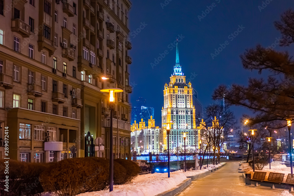 Evening Moscow. Capital of Russia. Winter in Russia. Deserted street with lanterns. High-rise building on Kotelnicheskaya embankment. Architecture of Moscow. Tall building. Symbol of Moscow.