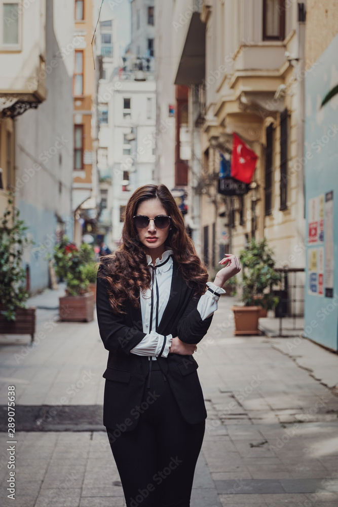 Beautiful woman walks at Istiklal street, Istambul Beautiful woman walks at Istiklal street, Istambul