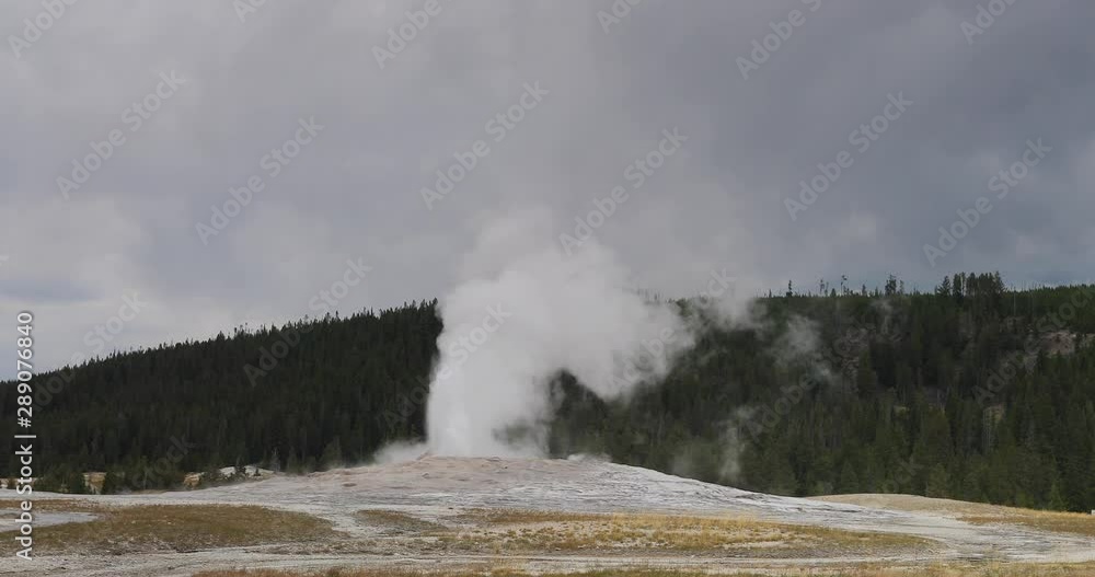 Yellowstone Old Faithful tourism after main eruption. Cone geyser National Park in Wyoming. Predictable geothermal ecosystem. Caldera, largest super volcano on the continent. Geography and ecology. Yellowstone Old Faithful tourism after main eruption. Cone geyser National Park in Wyoming. Predictable geothermal ecosystem. Caldera, largest super volcano on the continent. Geography and ecology.