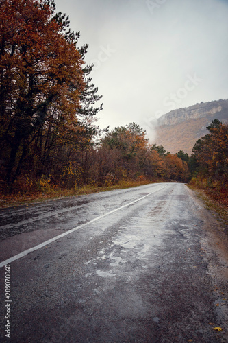 Beautiful colorful curved Autumn Fall road in the mountains of Crimea, Ukraine