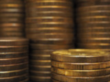 Piles of Russian ten-ruble coins. Blurred background