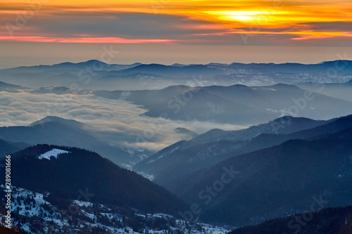 Amazing sunrise view from Ceahl  u Mountains National in winter season  Winter Landscape in National Park Ceahlau