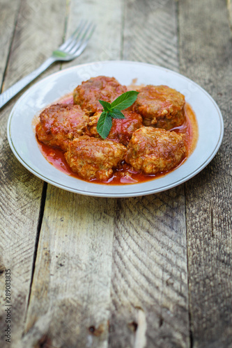 meatballs in tomato sauce (meat dish). food background. top view. copy space