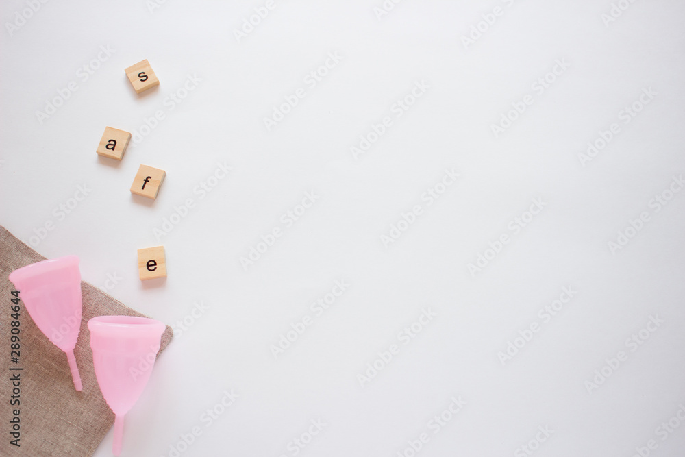 Menstrual cup on white background. Close up, flatlay Menstrual cup on white background. Close up, flatlay