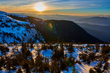 Amazing sunset view from Ceahlău Mountains National in winter season,Aerial winter Landscape