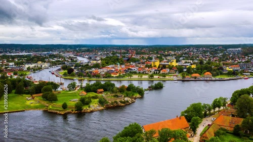 Fredrikstad, Norway. Aerial view of Glomma river in Fredrikstad, Norway with famous landmarks like Isegran Fort. Time-lapse with moving boats and clouds, zoom in photo