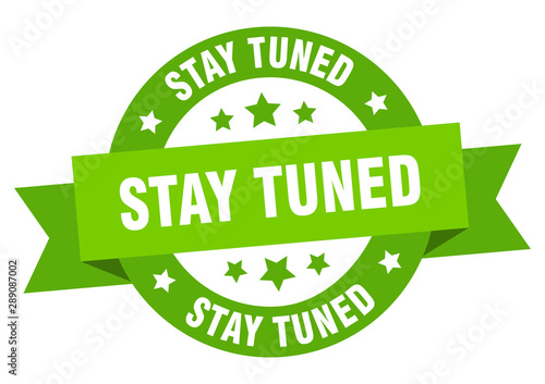stay tuned ribbon. stay tuned round green sign. stay tuned