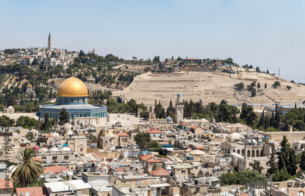 View of the Dome of the Rock and Mount of Olives from the bell tower of the Lutheran Church of the Redeemer on Muristan street in the Old City in Jerusalem, Israel