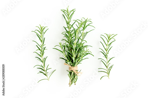 Fototapeta Naklejka Na Ścianę i Meble -  Green bundle of rosemary isolated on a white background. Мedicinal herbs. Flat lay. Top view