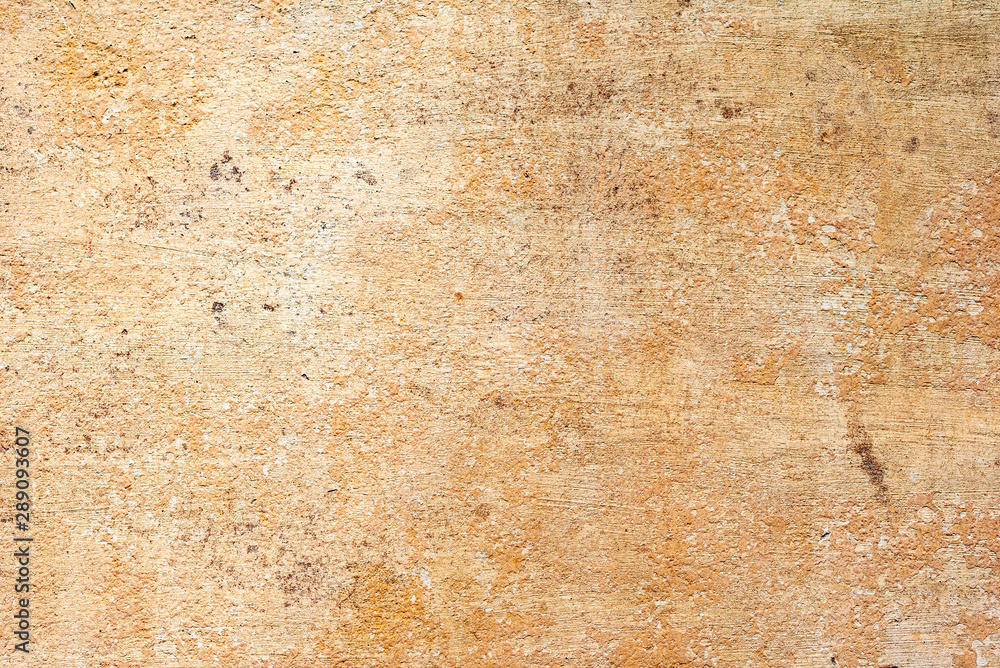 Texture of a concrete wall with cracks and scratches which can be used as a background Texture of a concrete wall with cracks and scratches which can be used as a background
