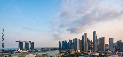 Photography Wide panorama of Singapore skyscrapers at dusk
