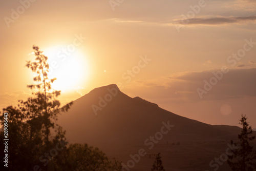 sunset  mountain  landscape  sun  sunrise  sky  silhouette  nature  mountains  tree  orange  morning  fog  clouds  dusk  horizon  dawn  hill  beautiful  red  view  desert  sundown  light  evening