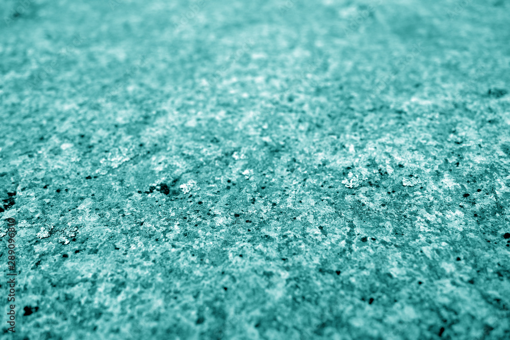 Obraz premium Marble stone background with blur effect in cyan tone.
