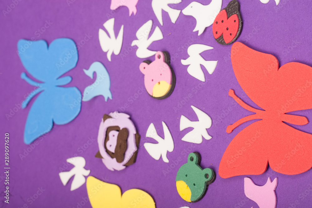 Fototapeta premium animals toys on a purple background