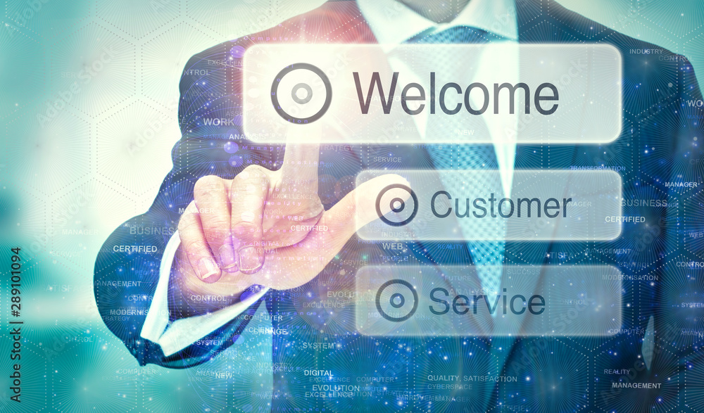 A businessman selecting a Welcome button on a futuristic display with a concept written on it. A businessman selecting a Welcome button on a futuristic display with a concept written on it.