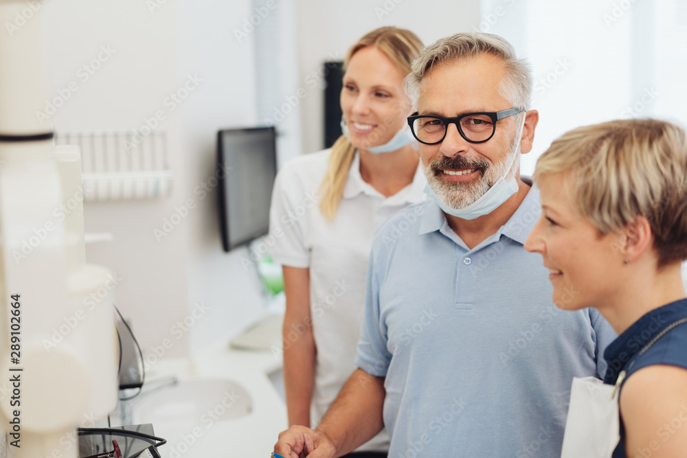 Fototapeta premium Friendly dentist smiling at the camera