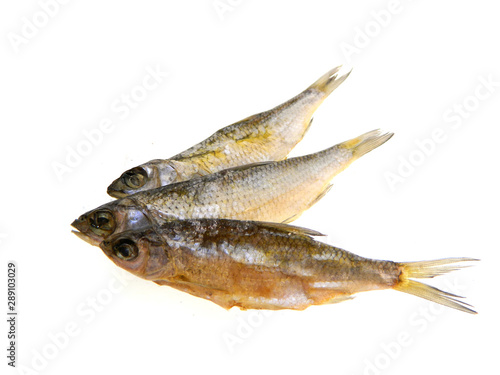 dry fish isolated on white background © Oleg