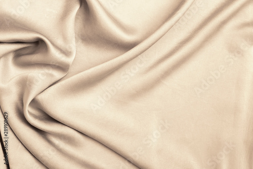 Blank shiny vintage tone fabric texture background, waving shiny vintage tone fabric pattern background