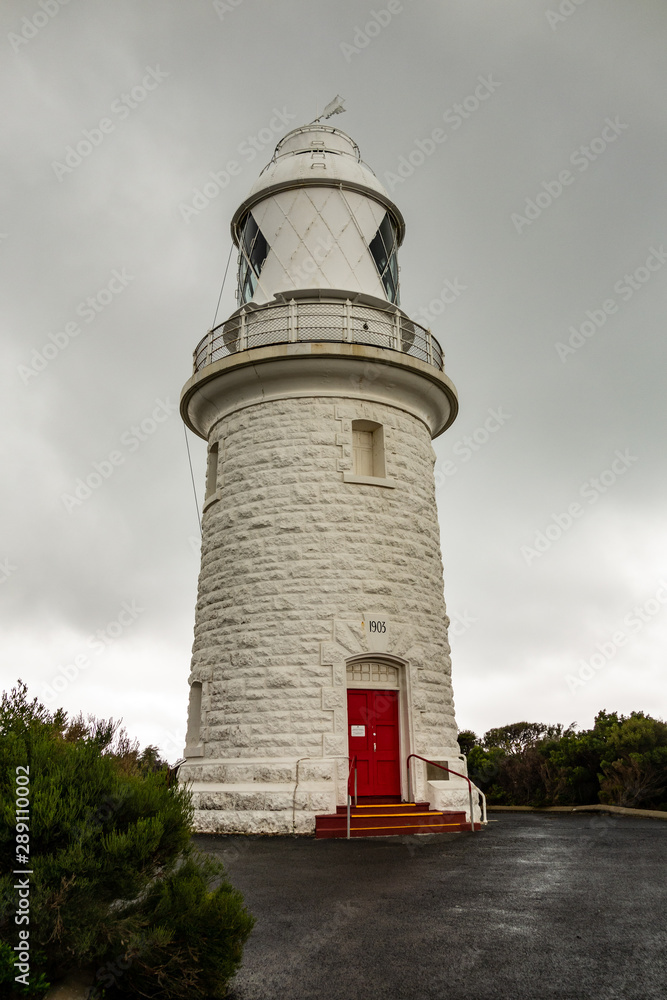 Very old white Cape Naturaliste lighthouse, important landmark in Western Australia