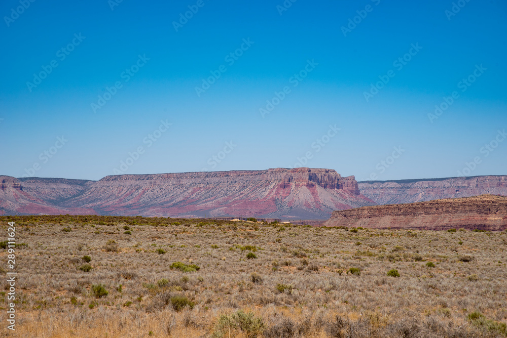 desert landscape with mountains and blue sky