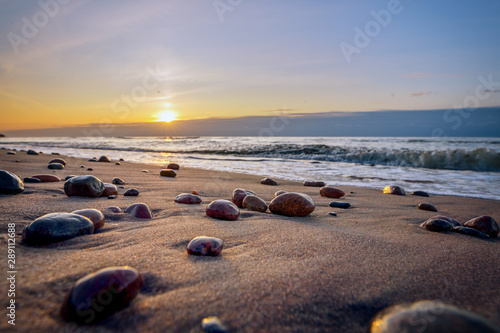 Colorful sunrise over the sea. Nature composition. Concept: holiday or calendar and picture postcards