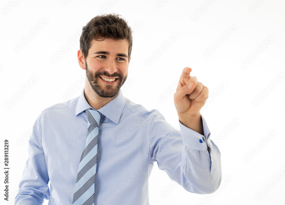 Portrait of a young handsome and confident businessman pointing as touching virtual screen Portrait of a young handsome and confident businessman pointing as touching virtual screen
