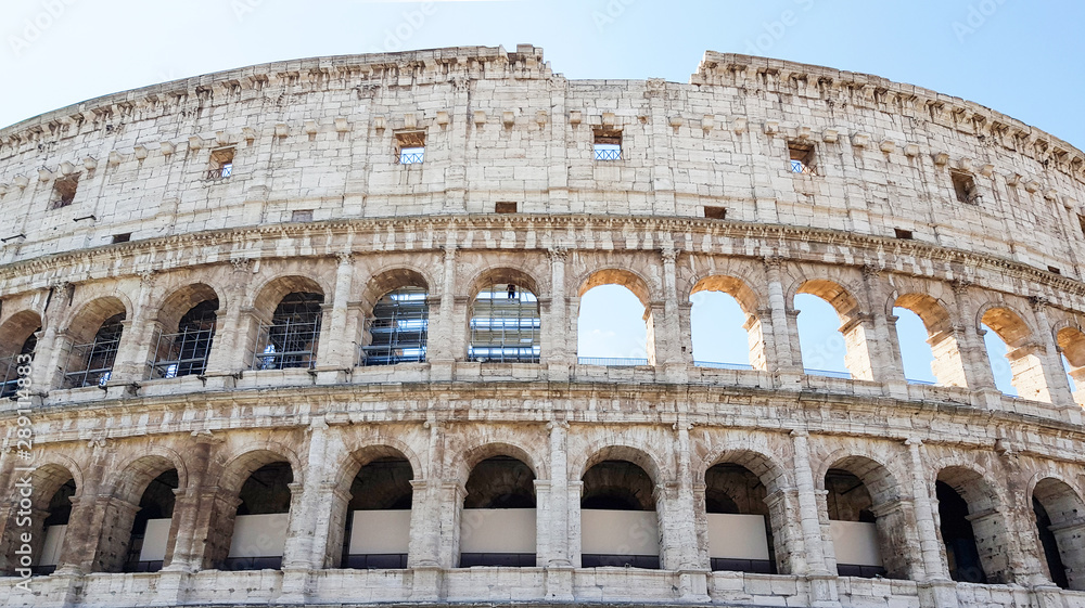 Colosseum in Rome, Italy, Architecture and landmark. Rome Colosseum is one of the main and famous attractions of Rome. Postcard of Rome.