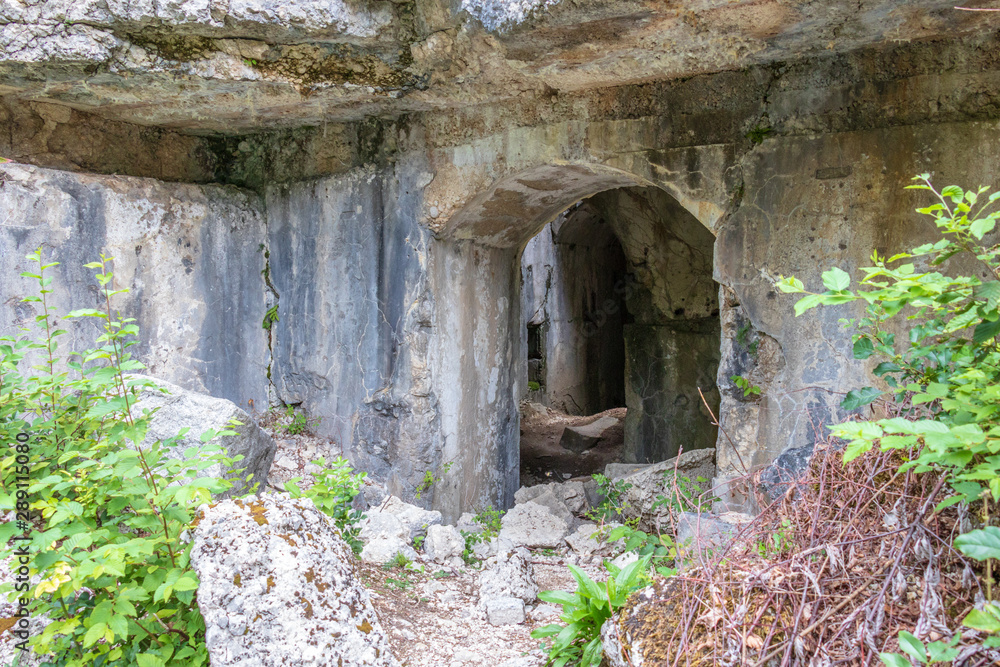 Inside corridors and doors of Fort Hermann. Crumbling World War I Fortress near Mount Rombon. Bovec, Gorizia, Slovenia.