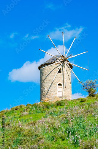 View of Windmills and Sunny sky with fluffy clouds at Izmir, Turkey. © ersoy