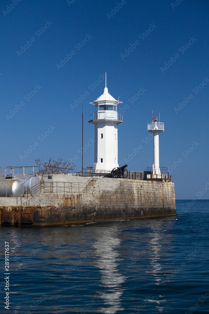 Lighthouse on the Yalta embankment. Black Sea.