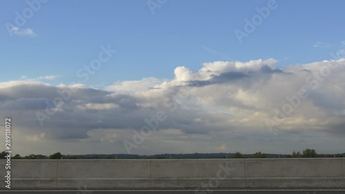 Busy Traffic Passing Through On A British Road In Nottingham, Clouds Moving Past Autumn Day. photo