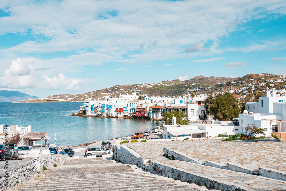 Panoramic view to Mykonos Chora in Greece, one of the most beautiful and popular destinations for summer holidays vacations in Europe with white houses and blue colors near the Aegean sea