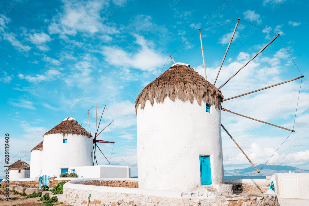 The white windmills of Mykonos Island, Kato Mili close to Little Venice, Cyclades, Greece - obrazy, fototapety, plakaty 