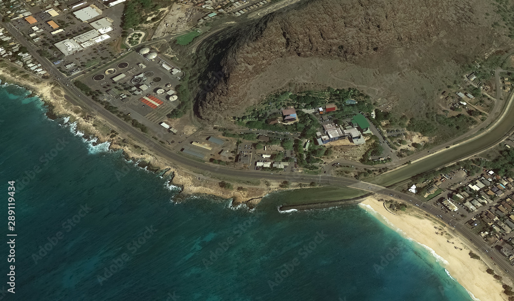 Pacific coast and infrastructure of Honolulu Hawaii USA from the height of the drone flight