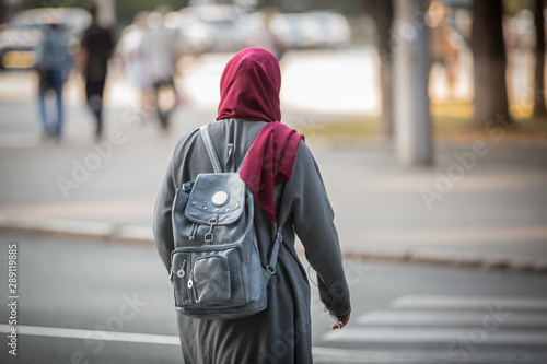 Photography A student from an Arab country walks in a European city