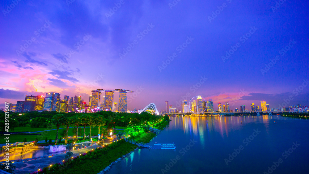 Royalty-free stock photo ID: 1488208352 Landscape of Singapore city during the twilight time and thunderbolt with marina bay sand tower, and Singapore flyer and Gardens by the Bay background. Tourist Royalty-free stock photo ID: 1488208352 Landscape of Singapore city during the twilight time and thunderbolt with marina bay sand tower, and Singapore flyer and Gardens by the Bay background. Tourist