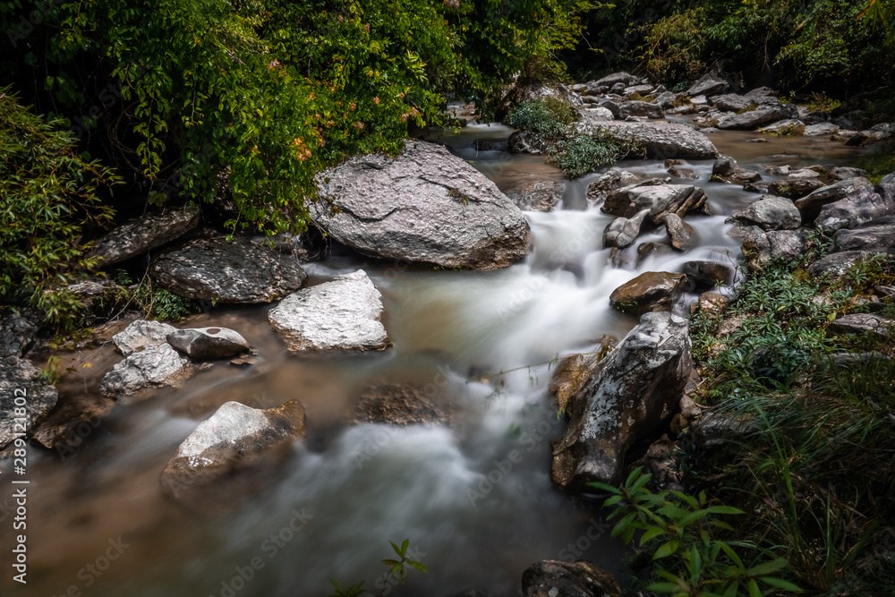Mountain stream at Hoang Su Phi, Ha Giang, Vietnam. Silky smooth water flow slow shutter speed. Rocky river landscape. Mountain stream at Hoang Su Phi, Ha Giang, Vietnam. Silky smooth water flow slow shutter speed. Rocky river landscape.