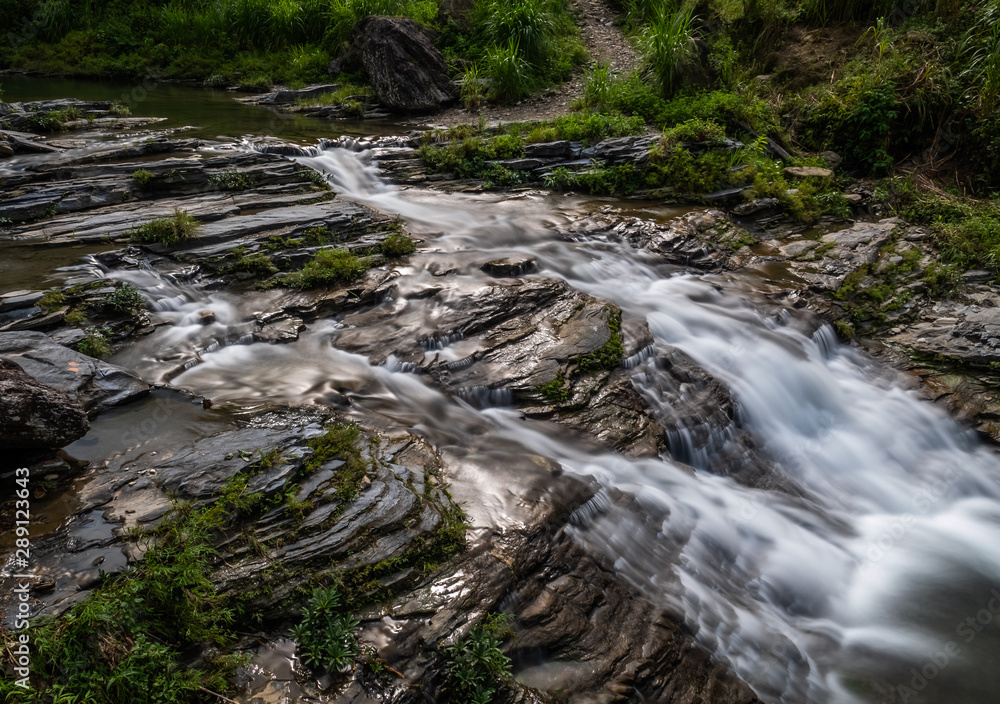 silky smooth waterfall. Long exposure shot of crystal clear fall at hoang su phi, vietnam. Ha Giang province landscape. Yoga and meditation concept. Silky smooth fall. silky smooth waterfall. Long exposure shot of crystal clear fall at hoang su phi, vietnam. Ha Giang province landscape. Yoga and meditation concept. Silky smooth fall.